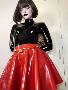 Black Latex Catsuit And Red Latex Skirt Layering